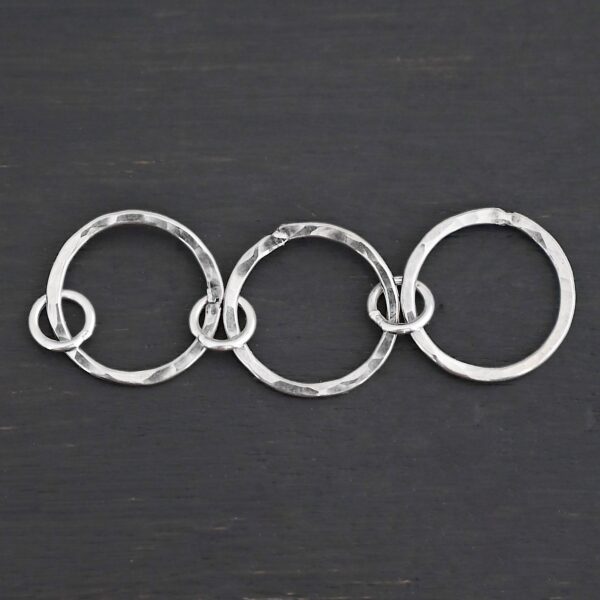 Elliot Hammered Bracelet Extension - shiny shown on dark background