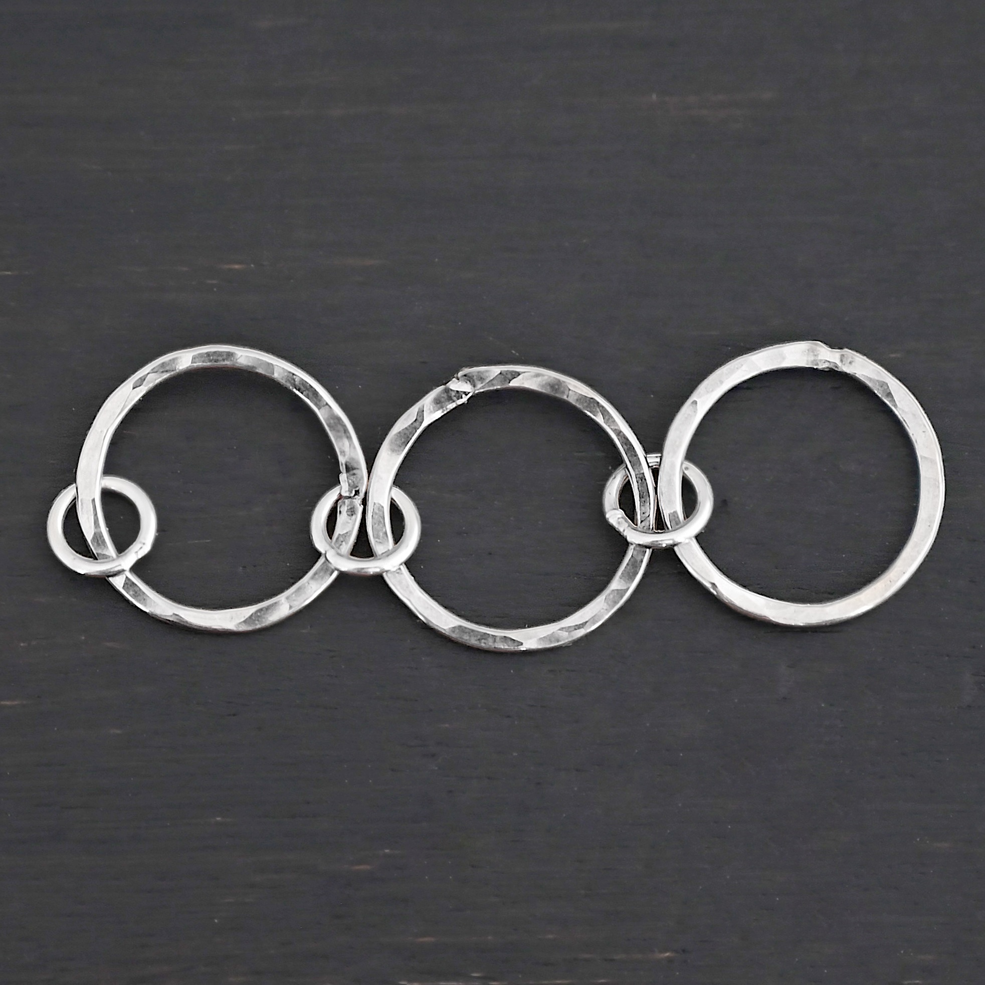 Elliot Hammered Bracelet Extension - shiny Elliot Hammered Bracelet Extension - shiny shown on dark background