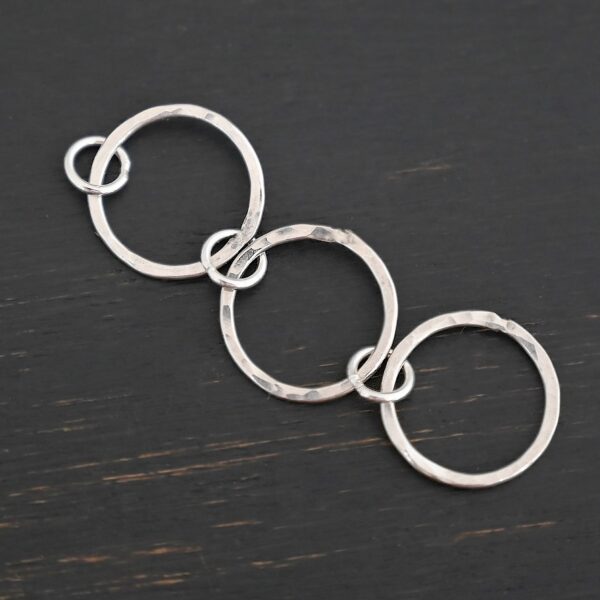 Elliot Hammered Bracelet Extension - shiny shown on dark background
