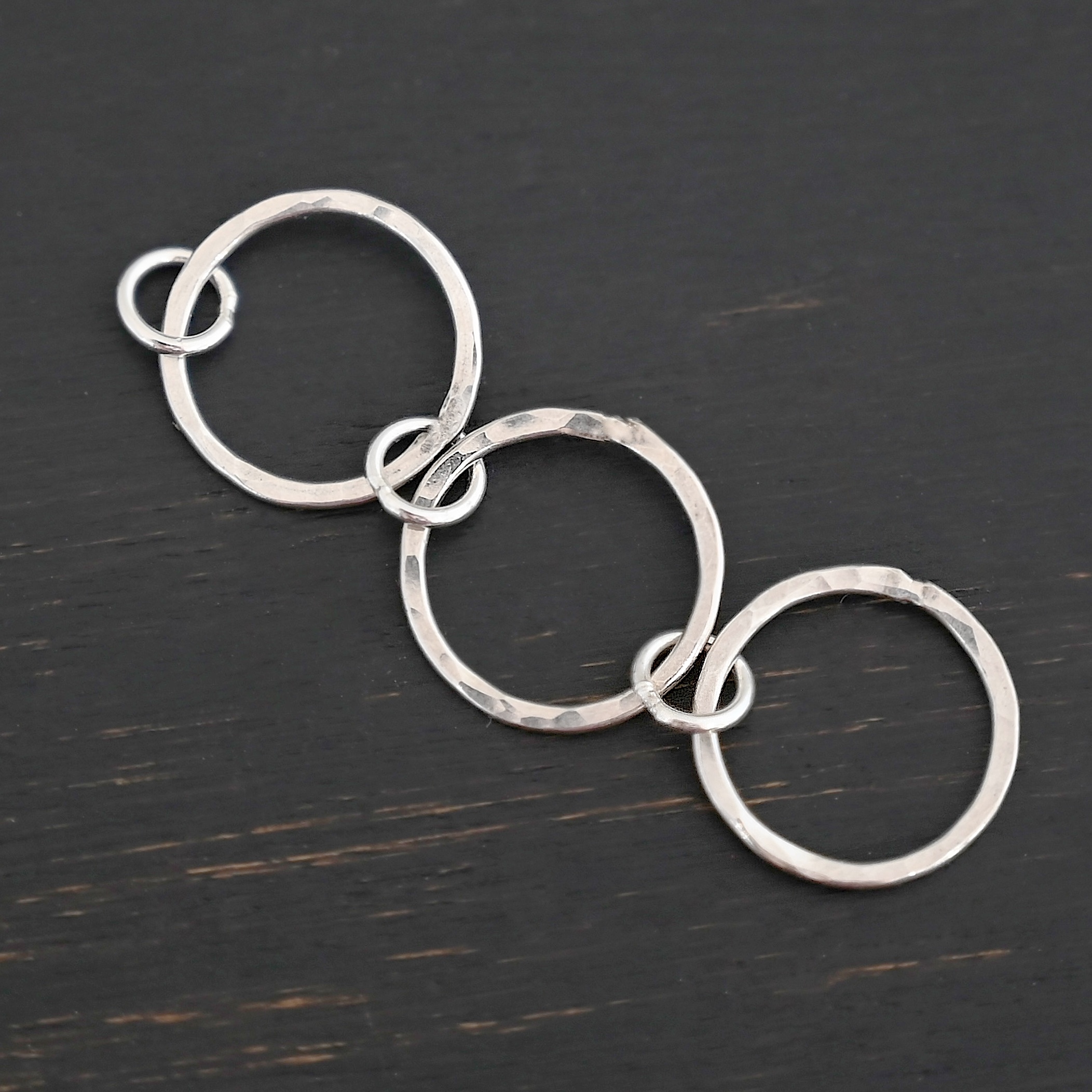 Elliot Hammered Bracelet Extension - shiny Elliot Hammered Bracelet Extension - shiny shown on dark background