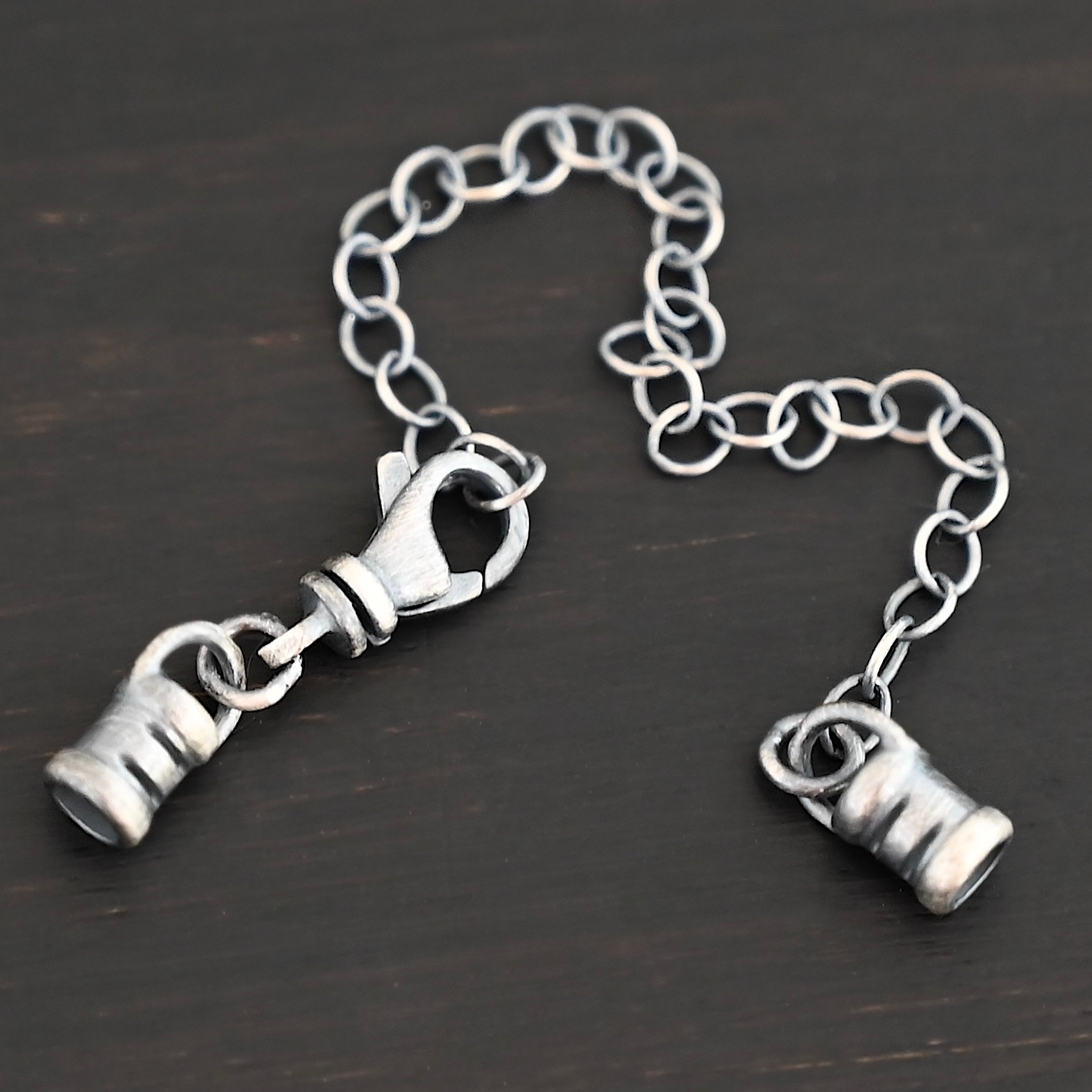 Emerson Extension - oxidized shown on dark background