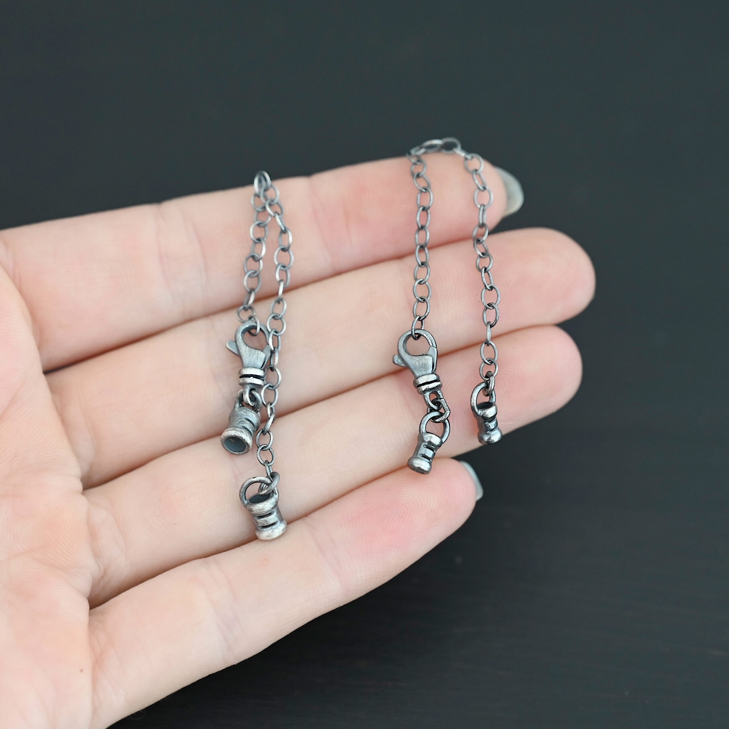 Emerson Extension - oxidized shown in hand