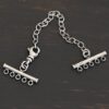 Matthew multistrand clasp - oxidized 5 strand shown on dark background