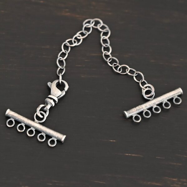 Matthew multistrand clasp - oxidized 5 strand shown on dark background