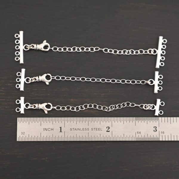 Matthew multistrand clasp - shiny shown by ruler