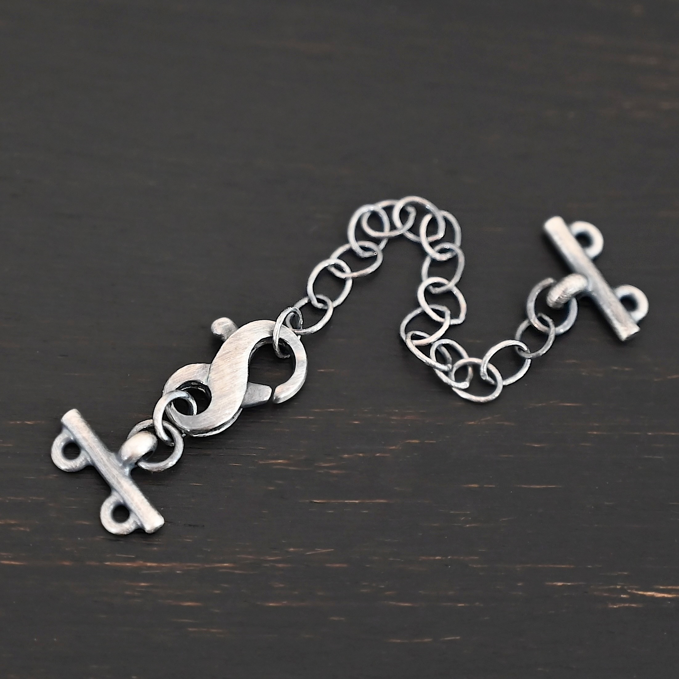Max multistrand clasp - oxidized 2 strand shown on dark background