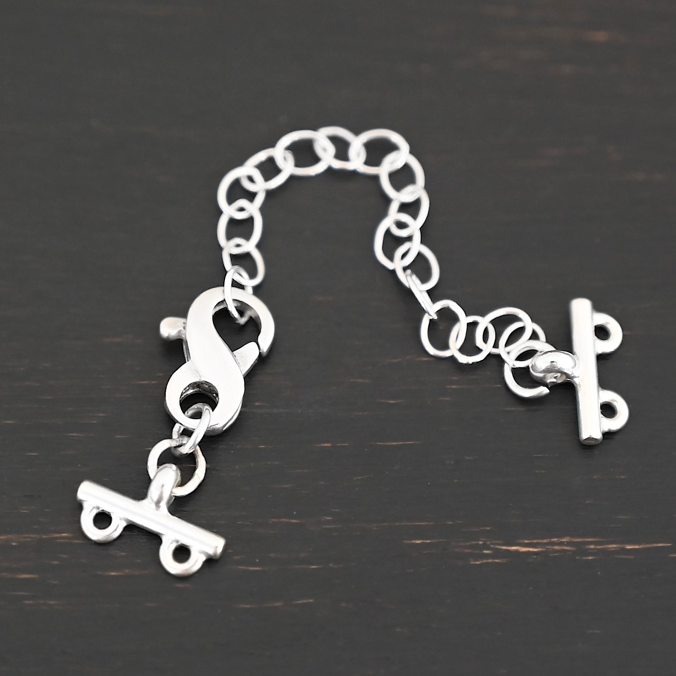 Max multistrand clasp - shiny 2 strand shown on dark background