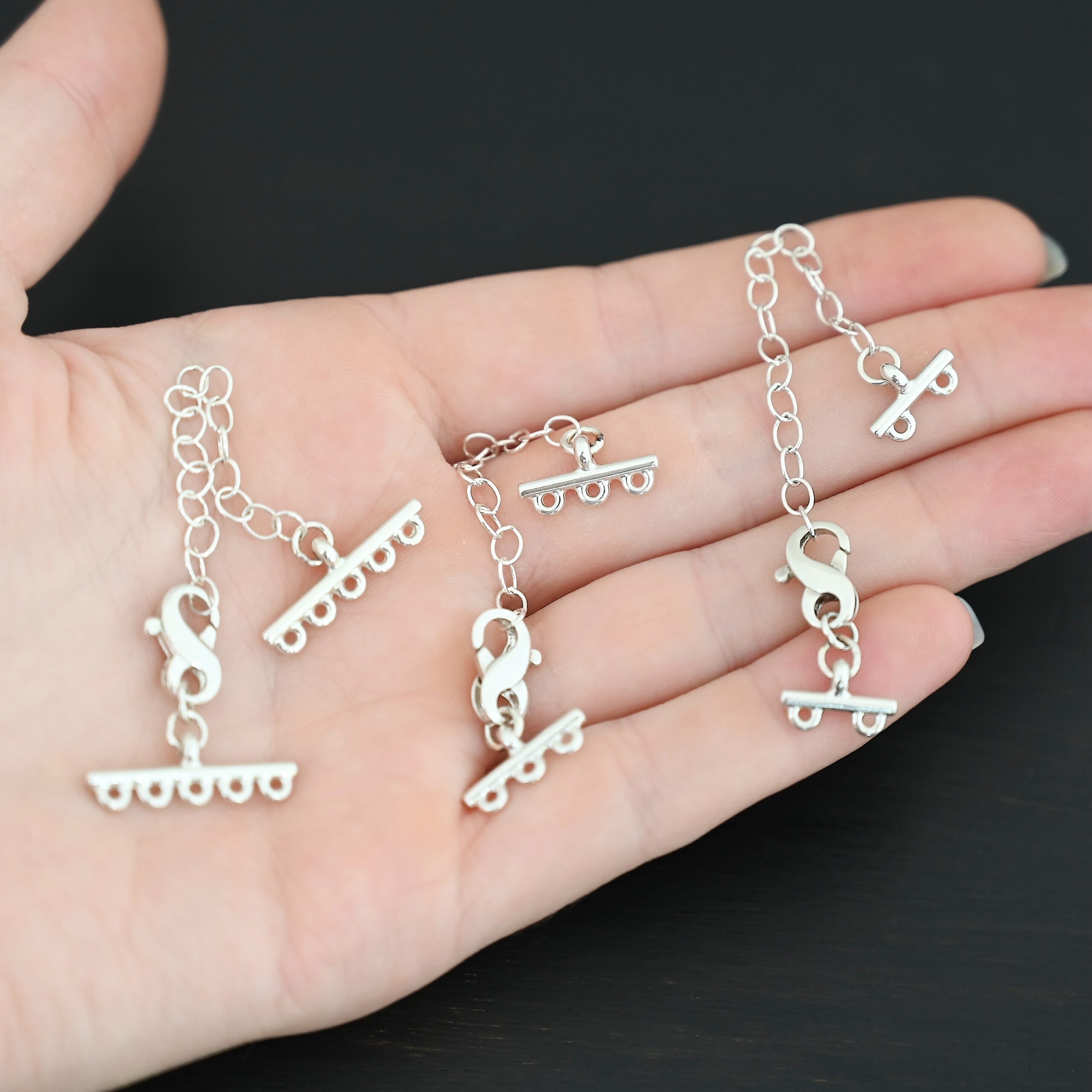 Max multistrand clasp - shiny shown in hand