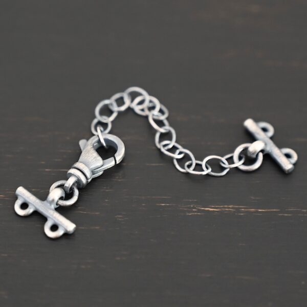 Myles multistrand clasp - oxidized 2 strand shown on dark background