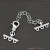 Myles multistrand clasp - oxidized 3 strand shown on dark background