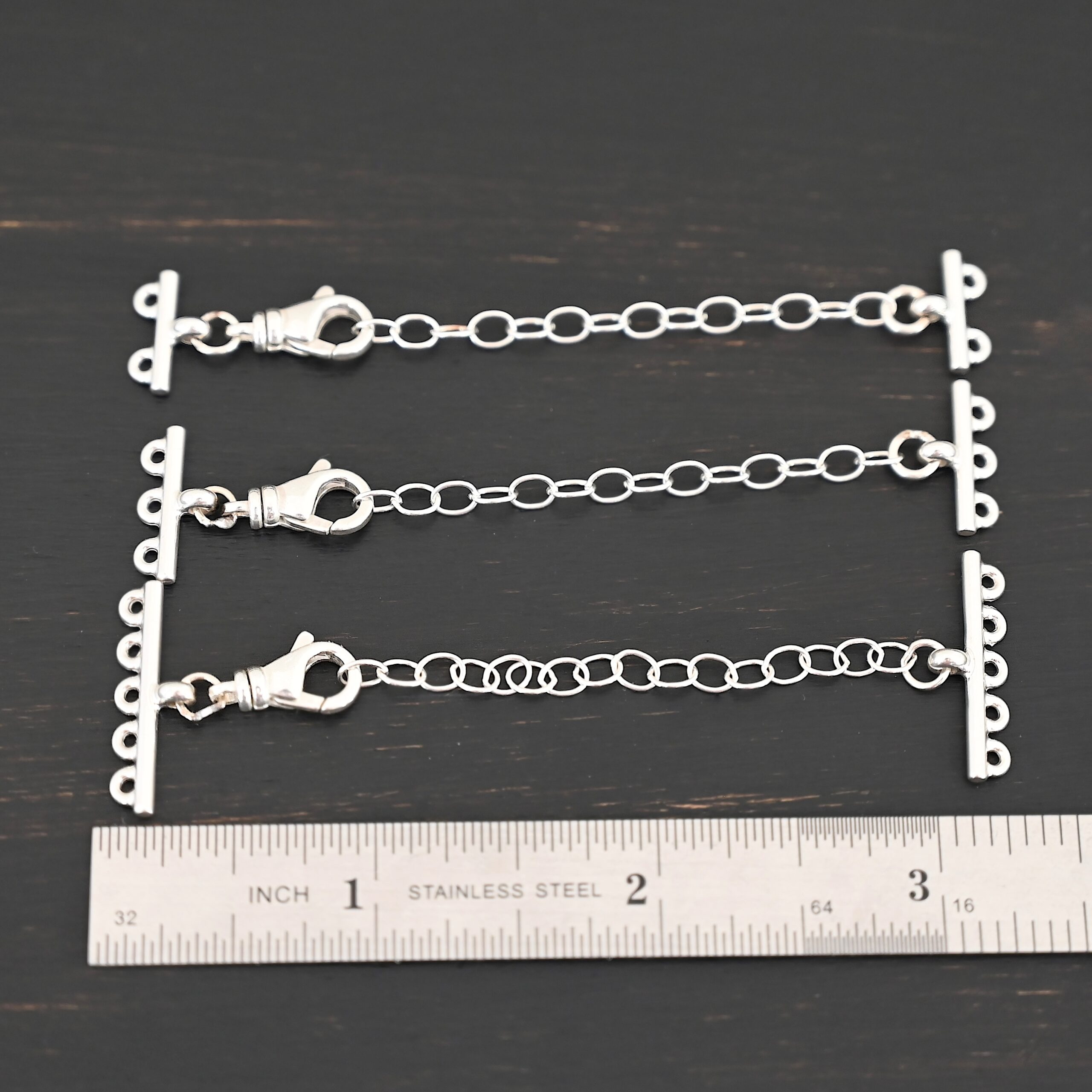 Myles multistrand clasp - shiny Myles multistrand clasp - shiny shown by ruler