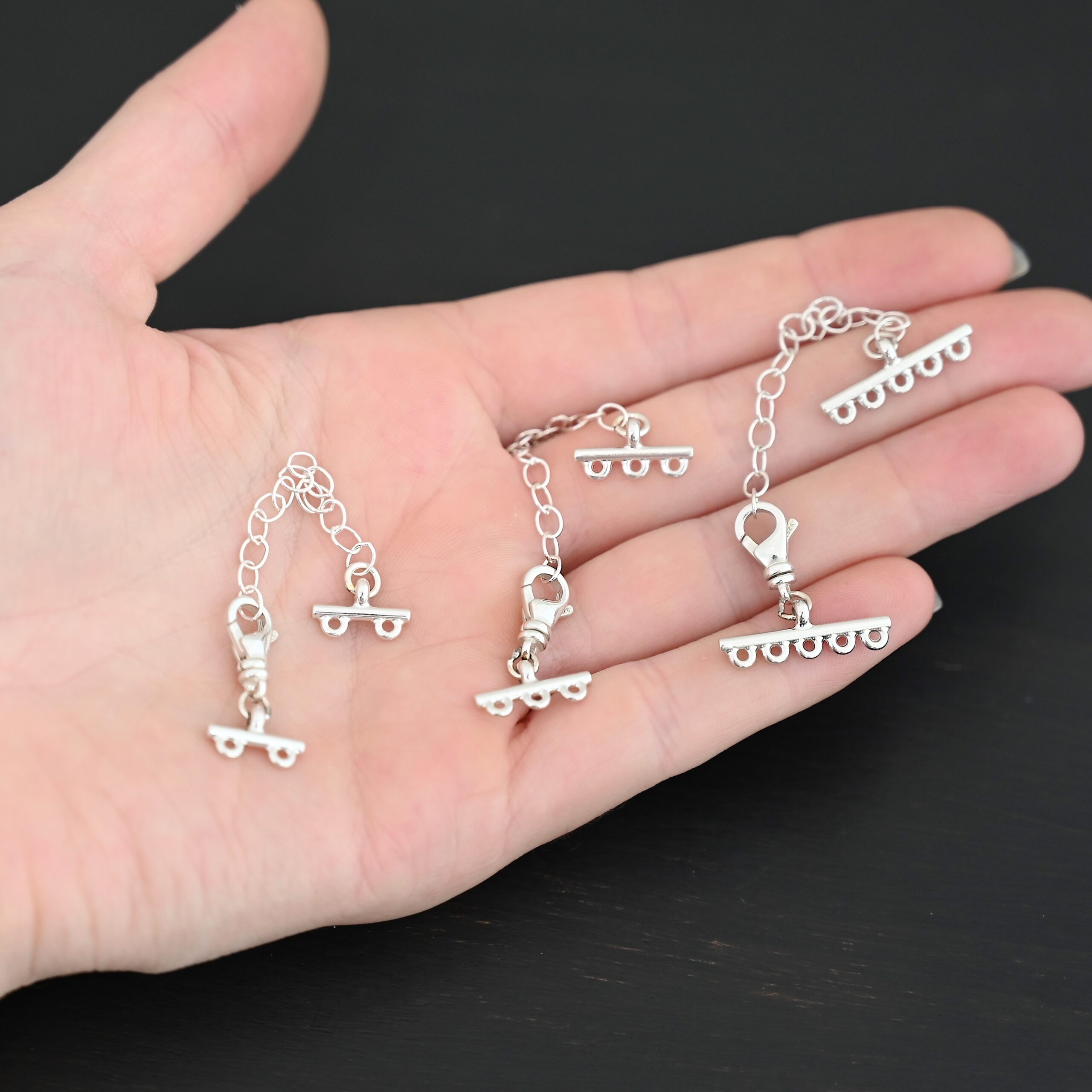 Max multistrand clasp - shiny Myles multistrand clasp - shiny shown in hand