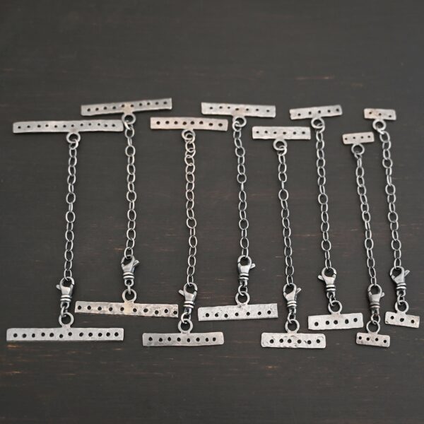 Mason multi strand clasp - oxidized on dark background