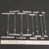 Mason multi strand clasp - oxidized shown by ruler