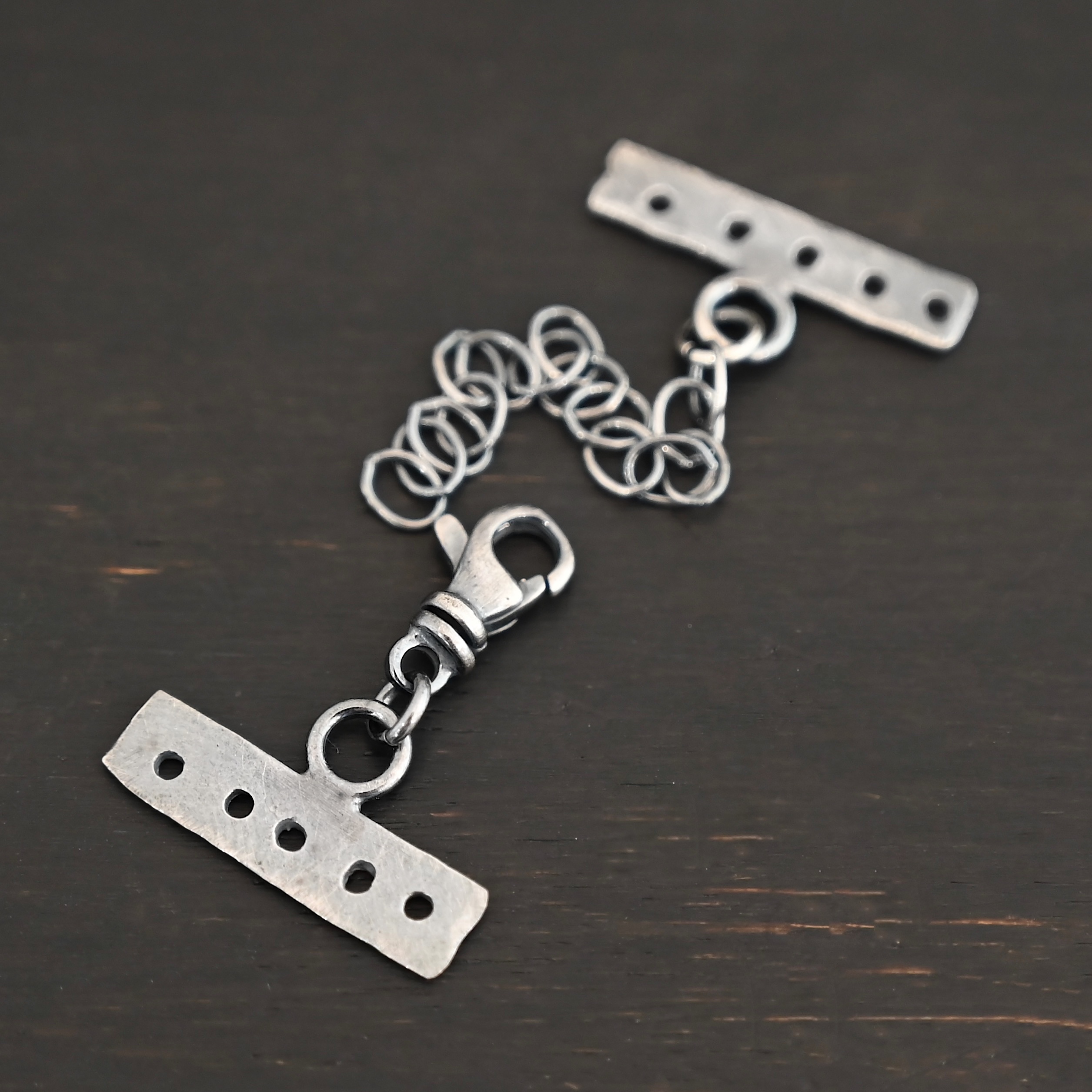 Mason multi strand clasp - oxidized 5 strand shown on dark background