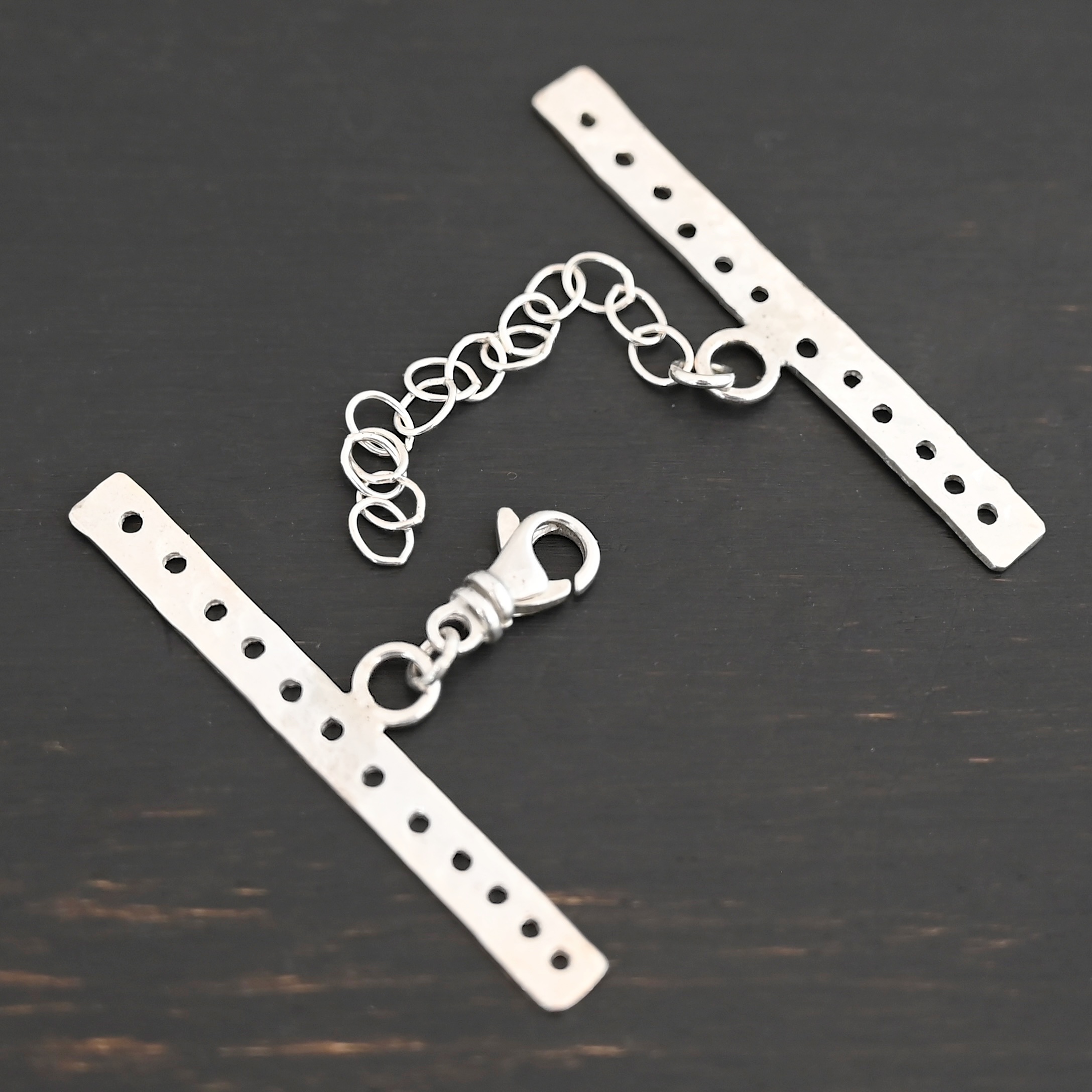 Mason multi strand clasp - shiny 12 strand shown on dark background