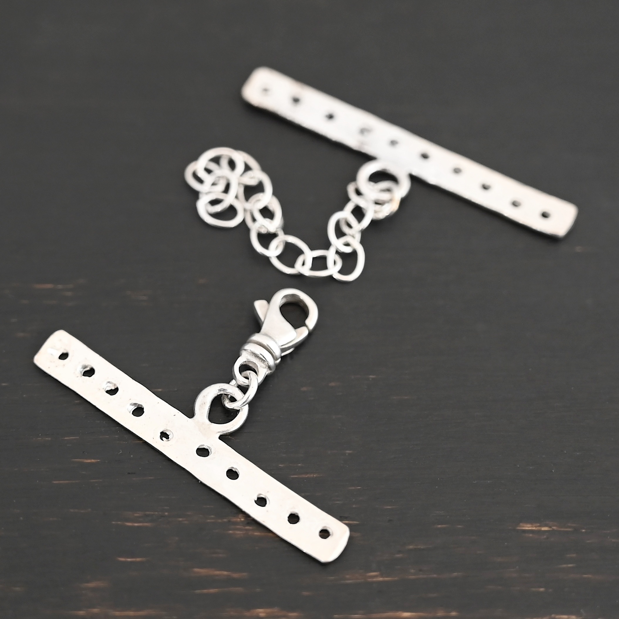 Mason multi strand clasp - shiny 10 strand shown on dark background