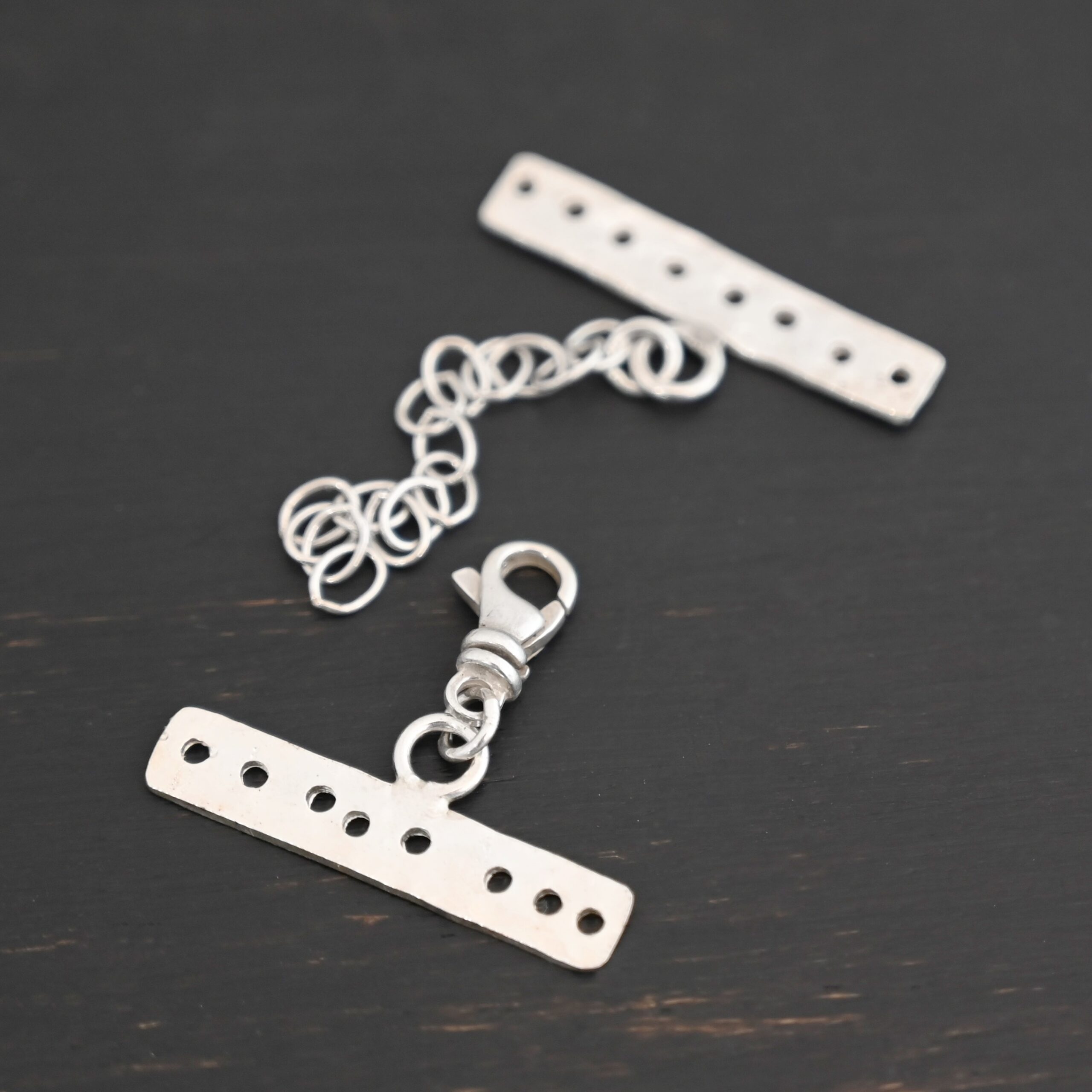 Mason multi strand clasp - shiny 8 strand shown on dark background