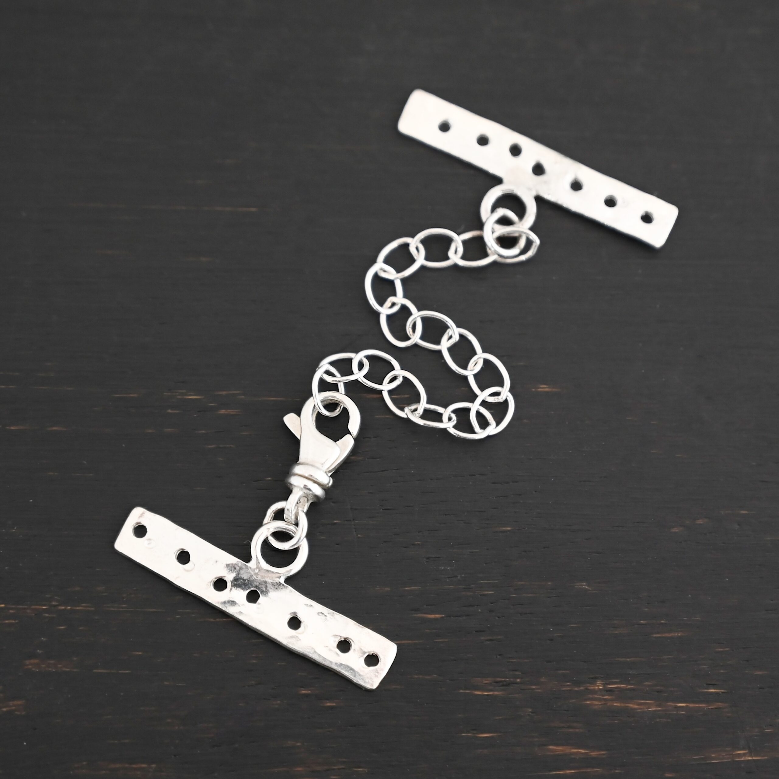 Mason multi strand clasp - shiny 7 strand shown on dark background