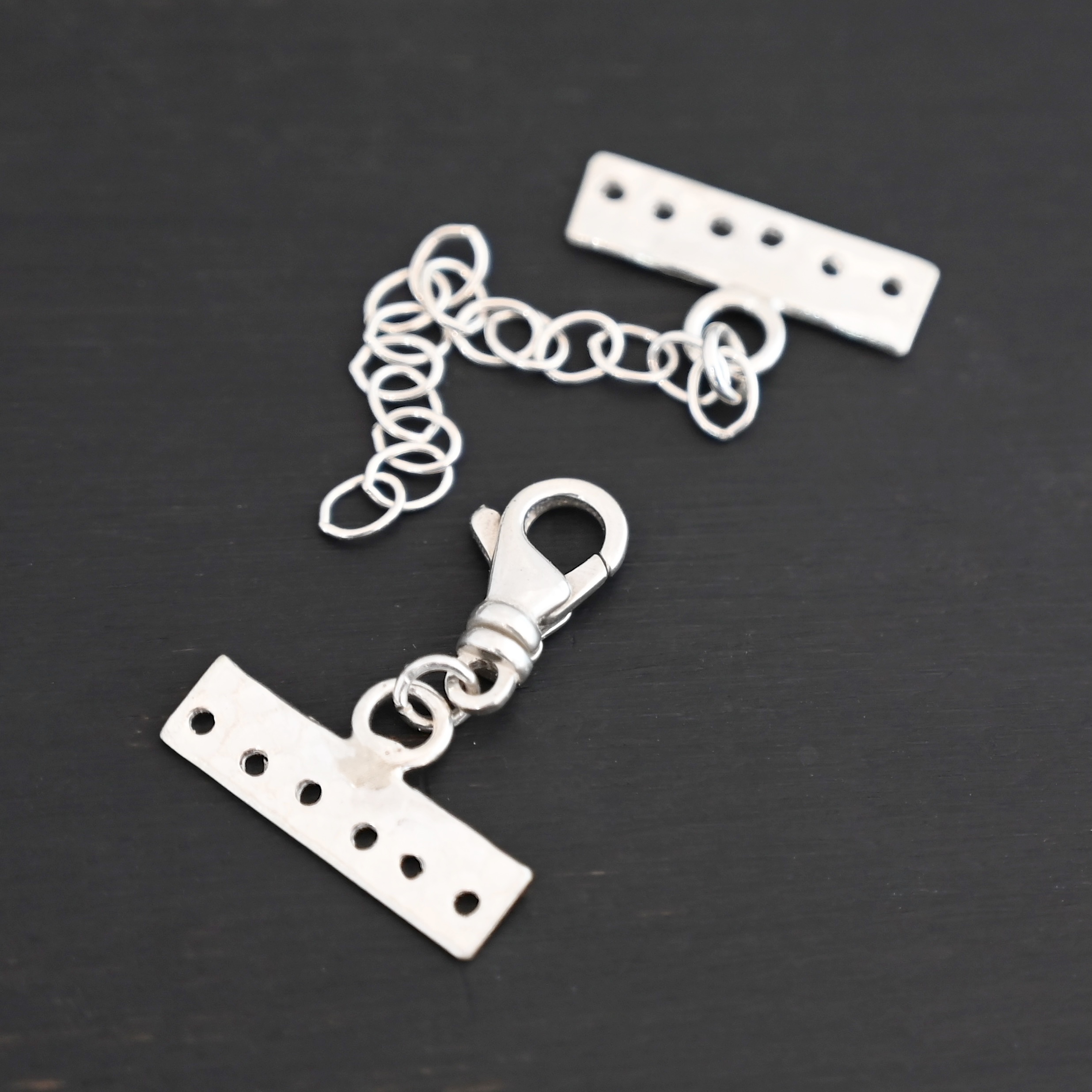 Mason multi strand clasp - shiny 6 strand shown on dark background