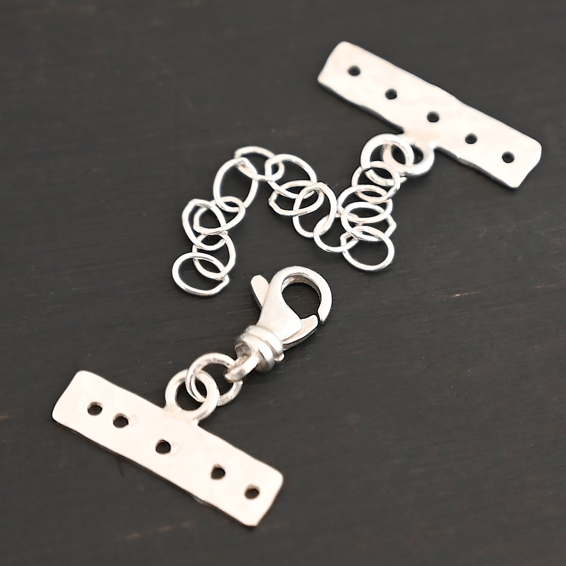 Mason multi strand clasp - shiny 5 strand shown on dark background