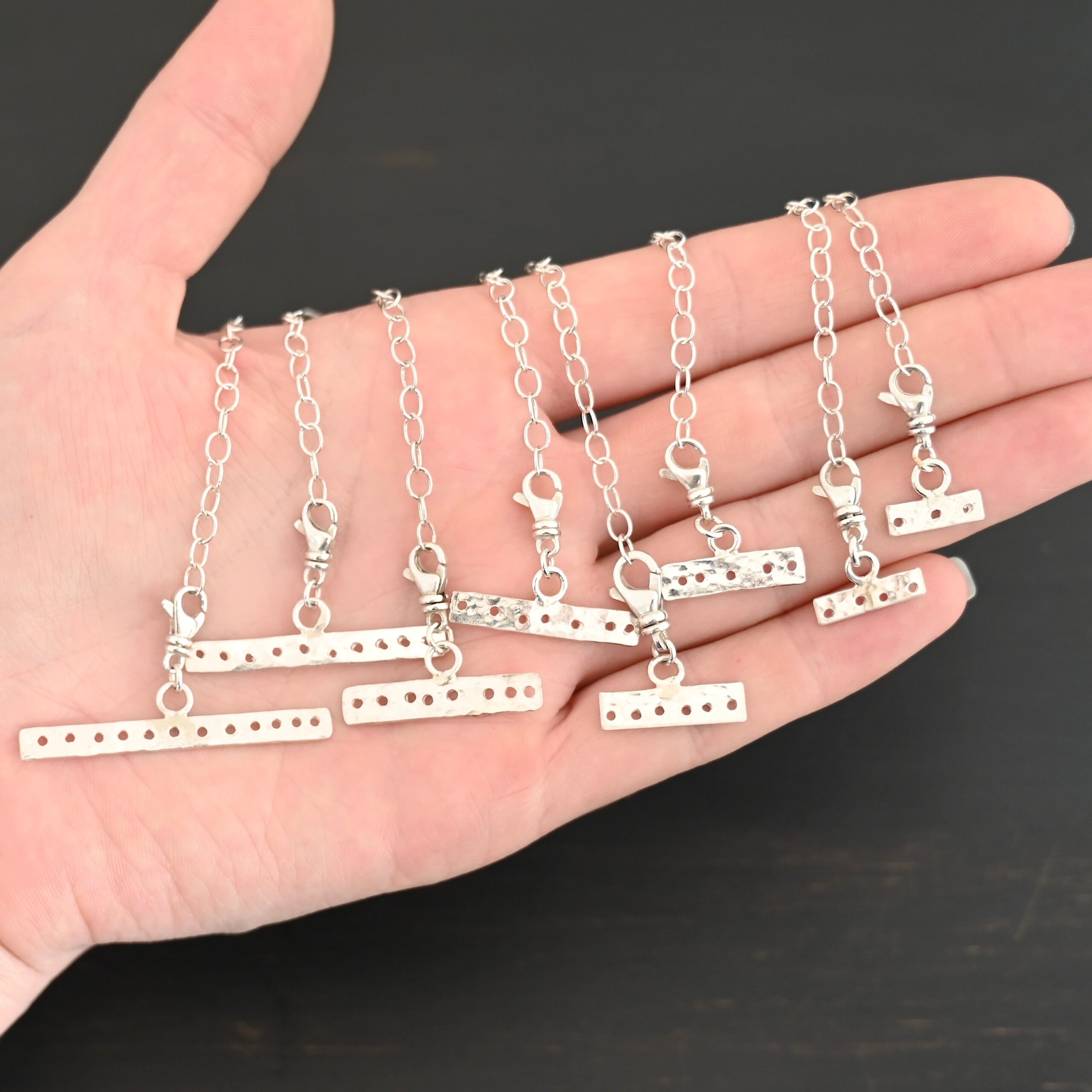 Mason multi strand clasp - shiny shown in hand