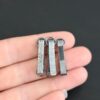 Hank Hook Clasp - oxidized shown in hand