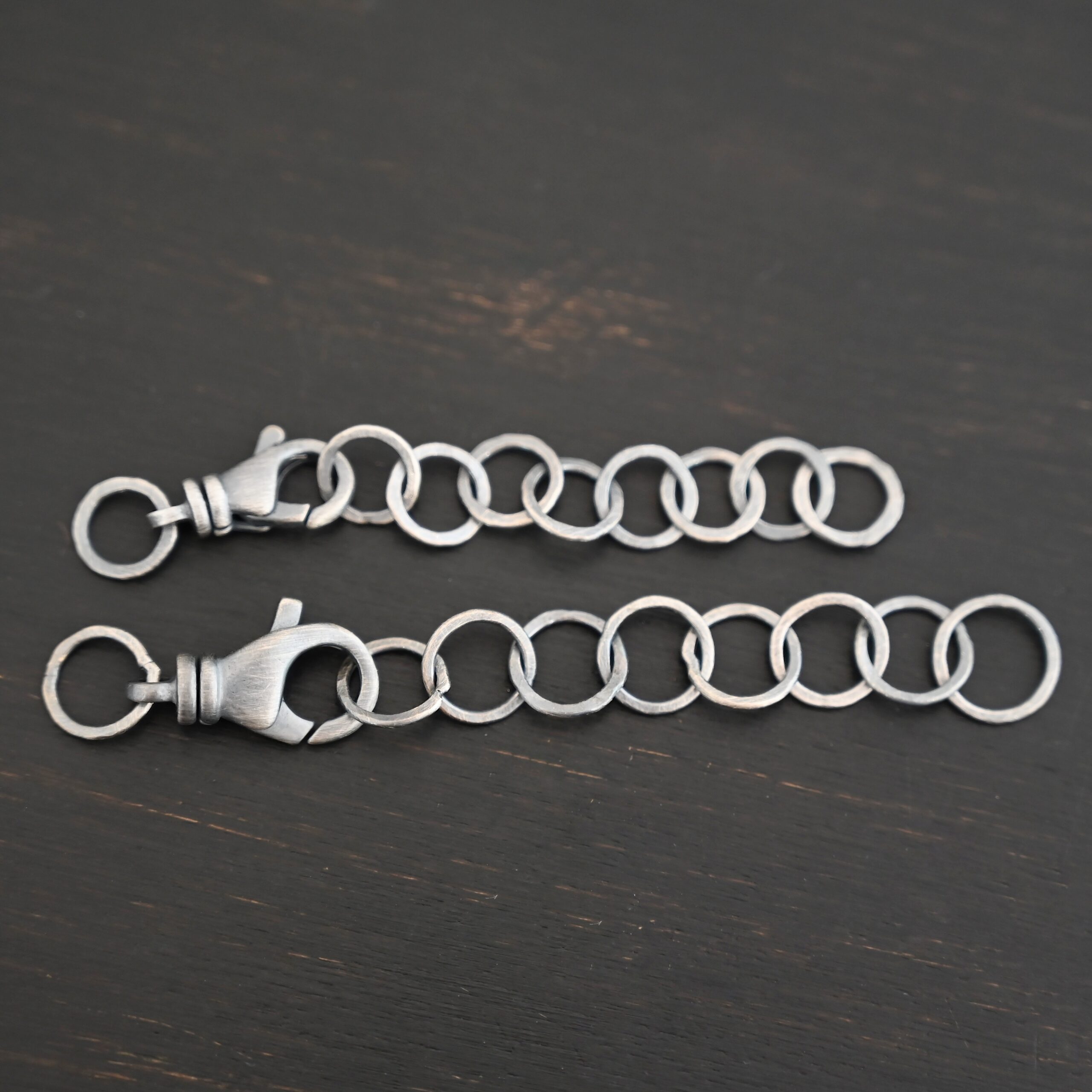 Eddie Extension - oxidized shown on dark background