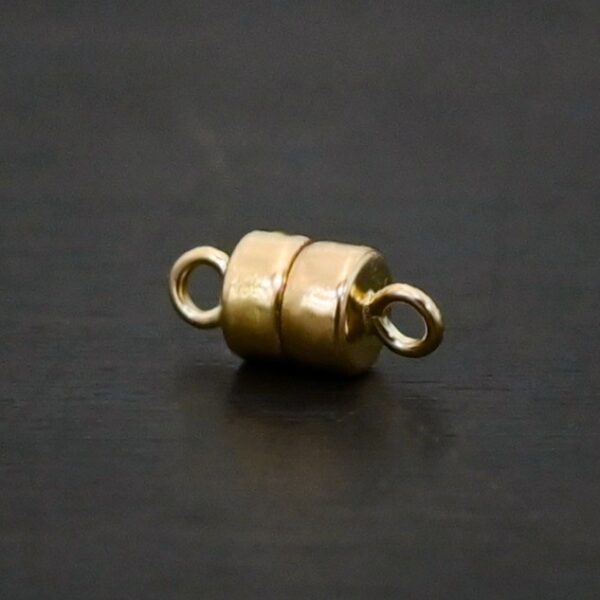 Mae 14k GF Round Disc Magnetic Clasp shown on dark background