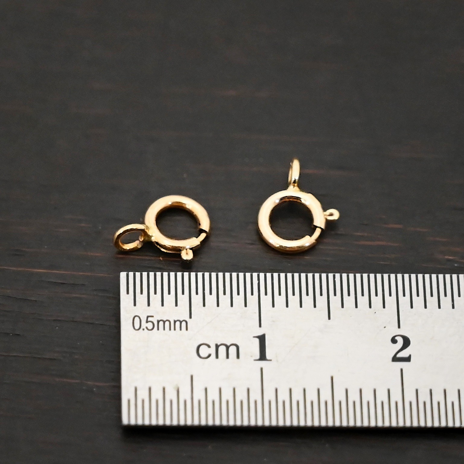 Skye 14k GF Spring Ring Clasp shown by ruler