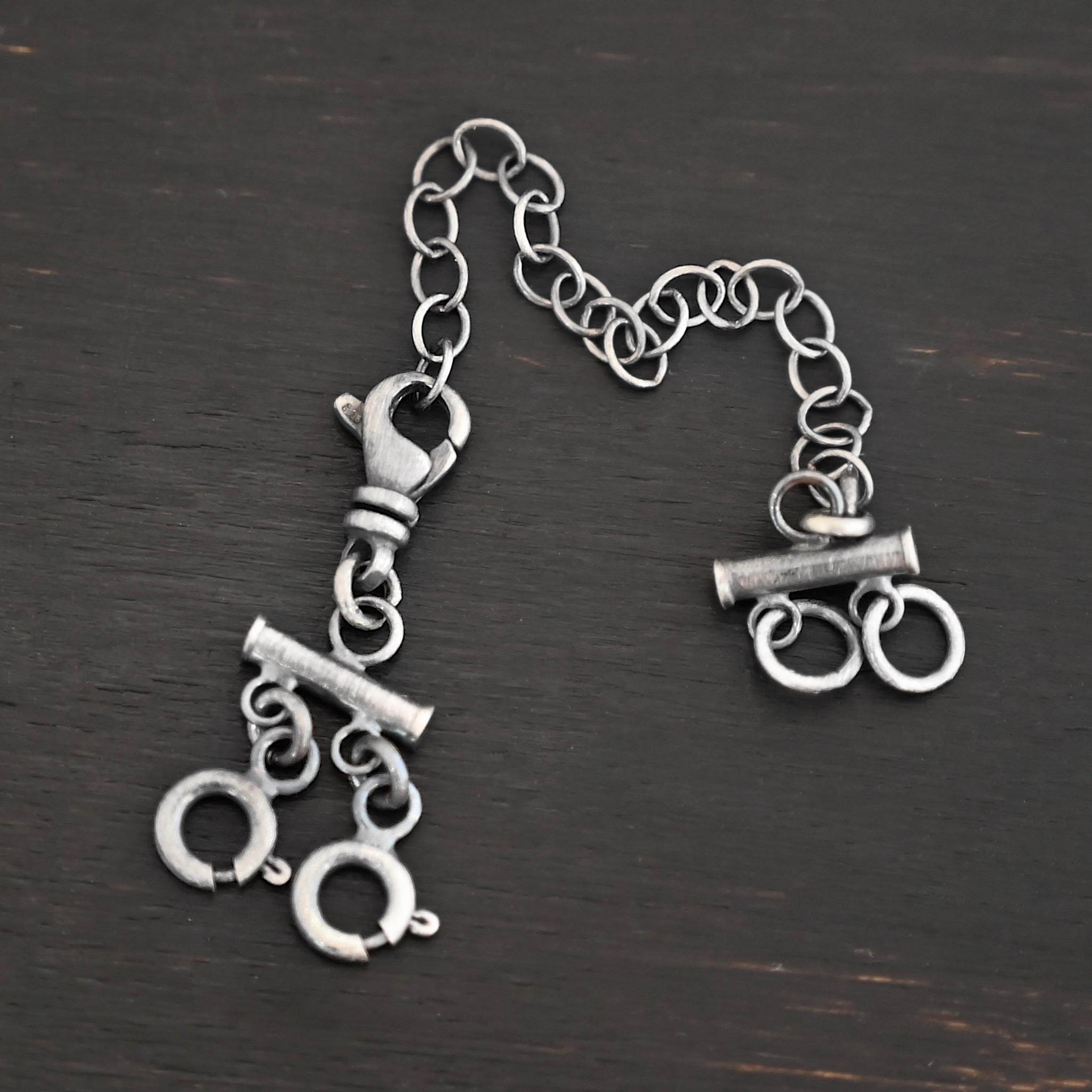 Matthew Multi strand necklace extender - oxidized 2 strand shown on dark background