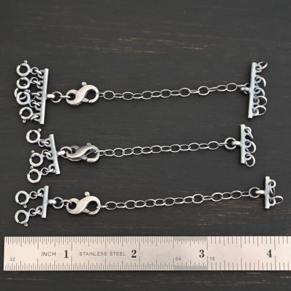 Max Multi strand necklace extender - oxidized shown by ruler