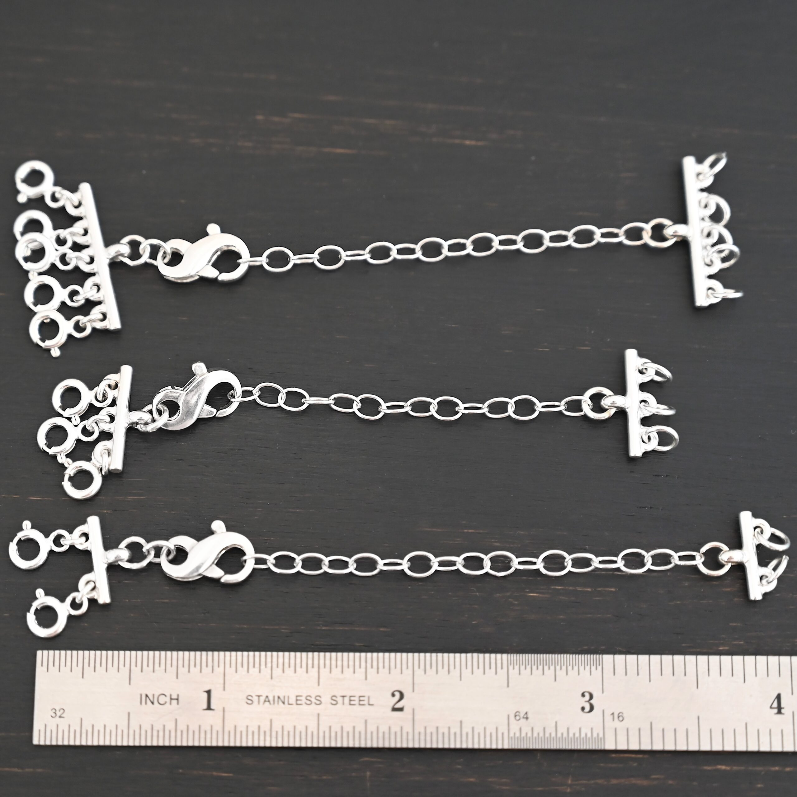 Max Multi strand necklace extender - shiny shown by ruler