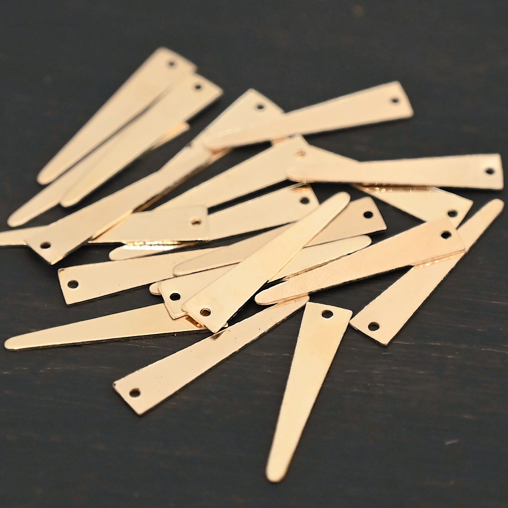 14k Gold Filled triangle blank - smooth shown on dark background