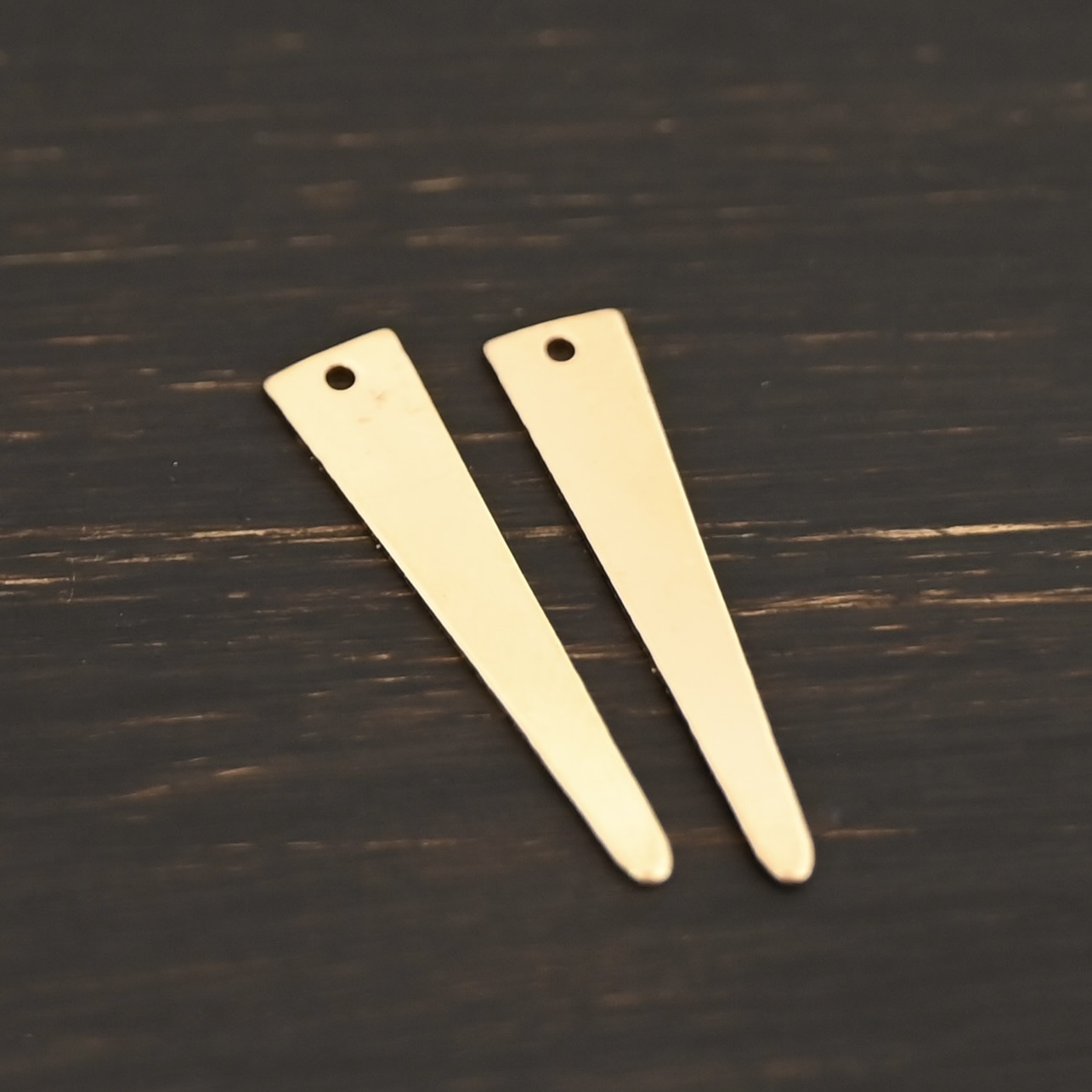 14k Gold Filled triangle blank - large smooth shown on dark background