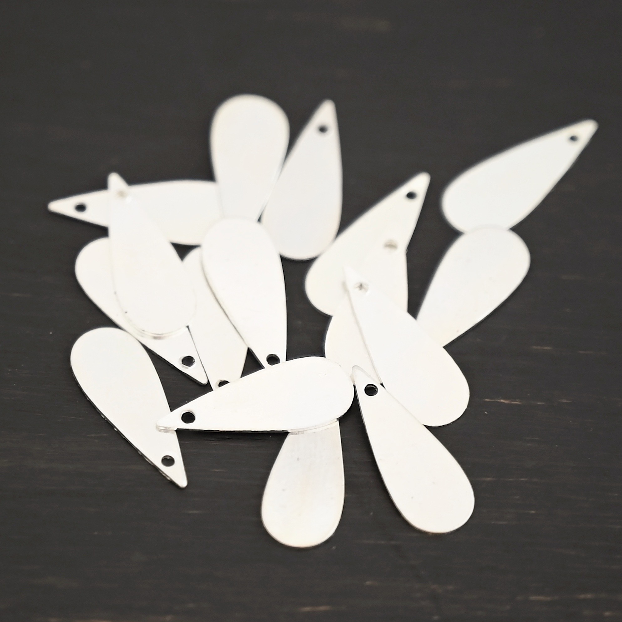 Sterling Silver Teardrop Blank - shiny smooth shown on dark background