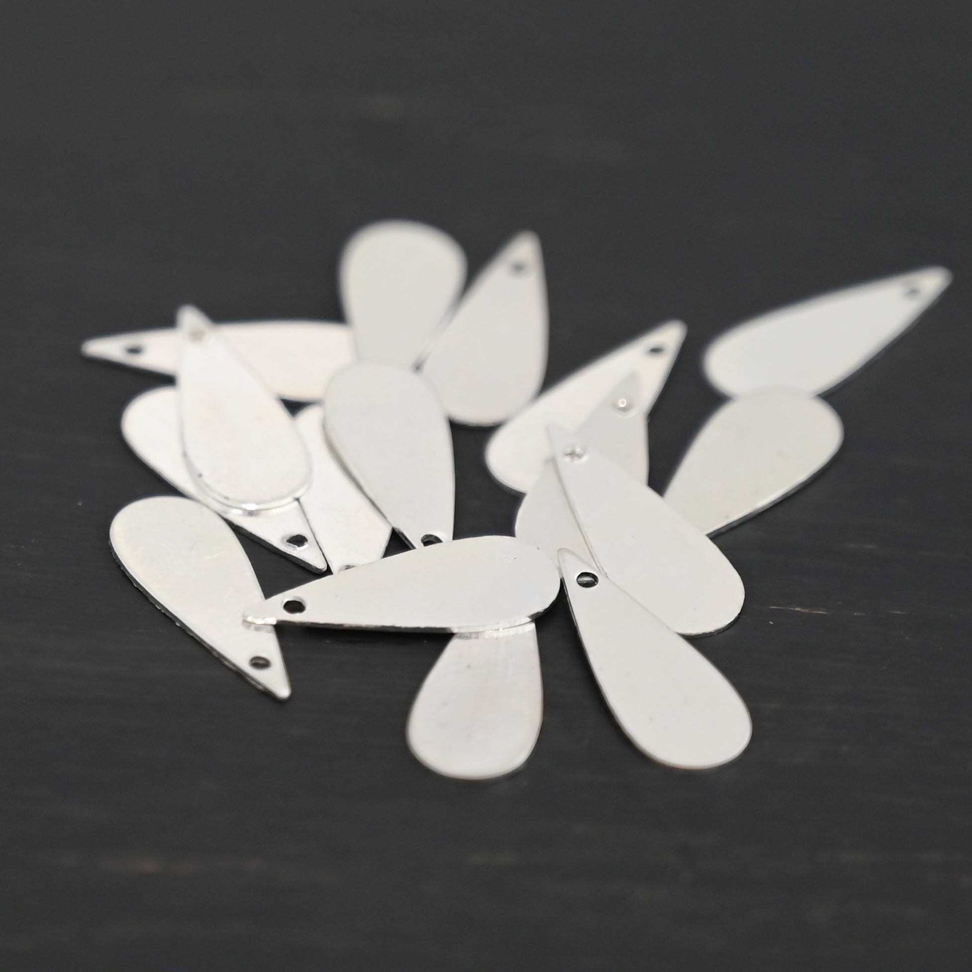 Sterling Silver Teardrop Blank - shiny smooth shown on dark background