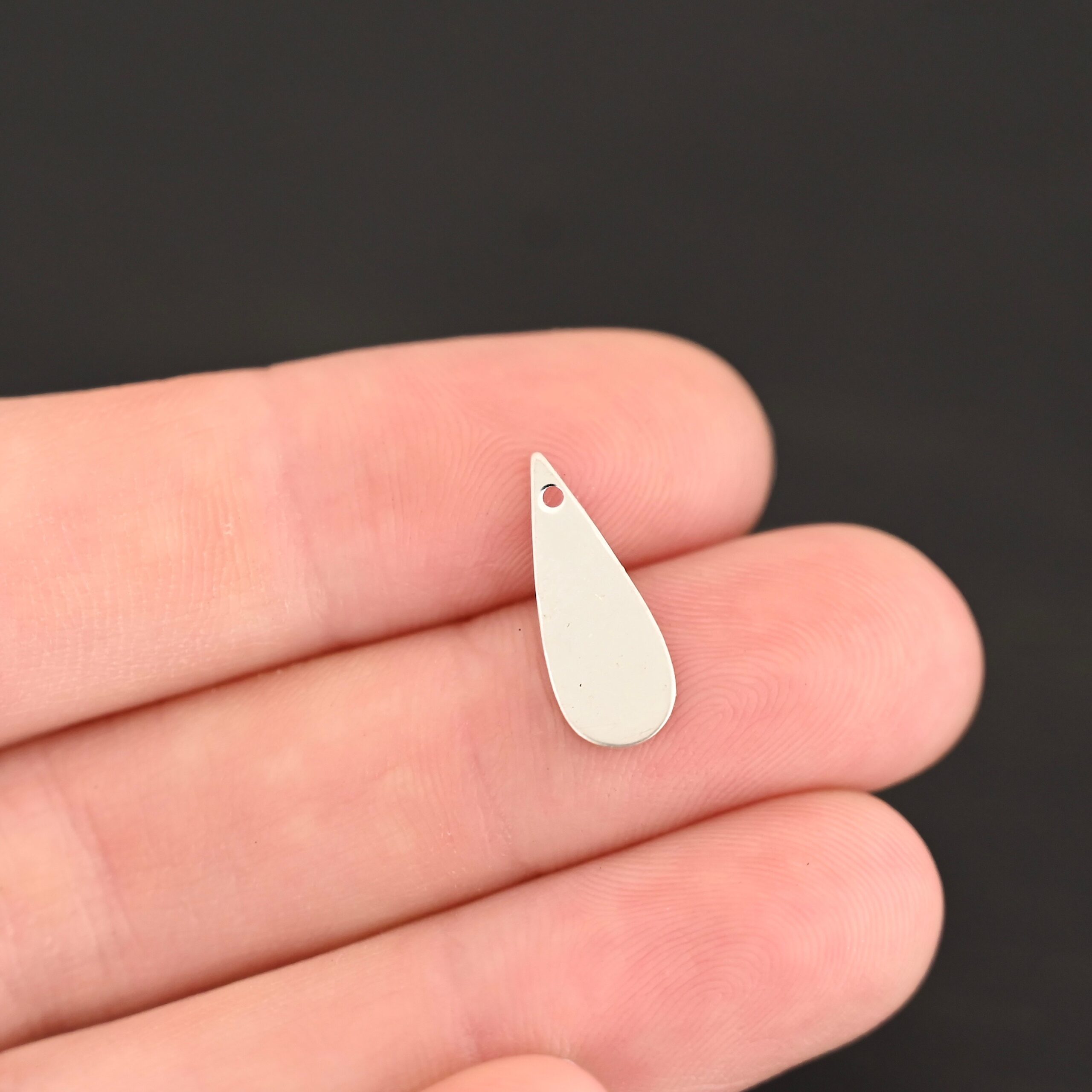 Sterling Silver Teardrop Blank - shiny smooth shown in hand