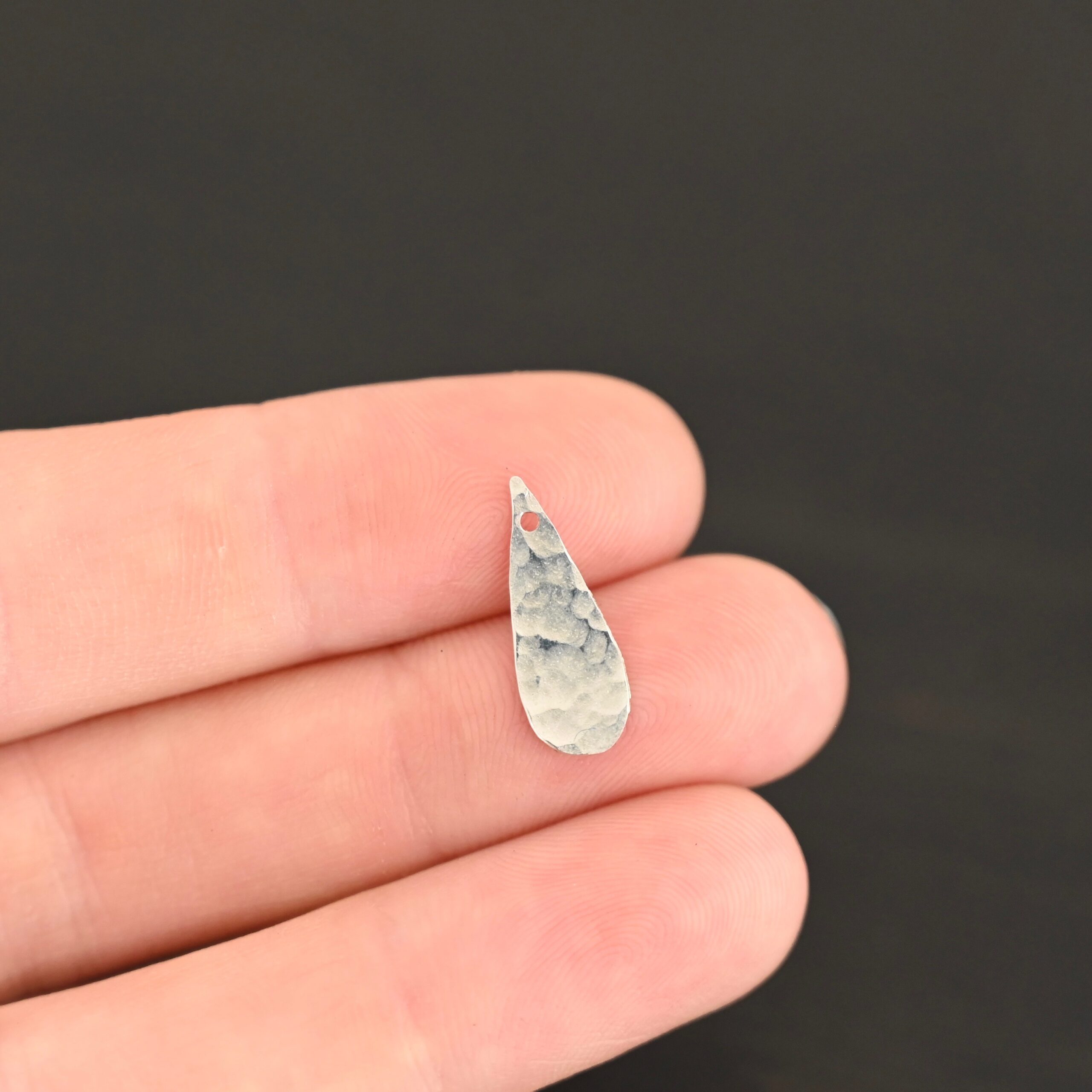 Sterling Silver Teardrop blank - shiny hammered shown in hand