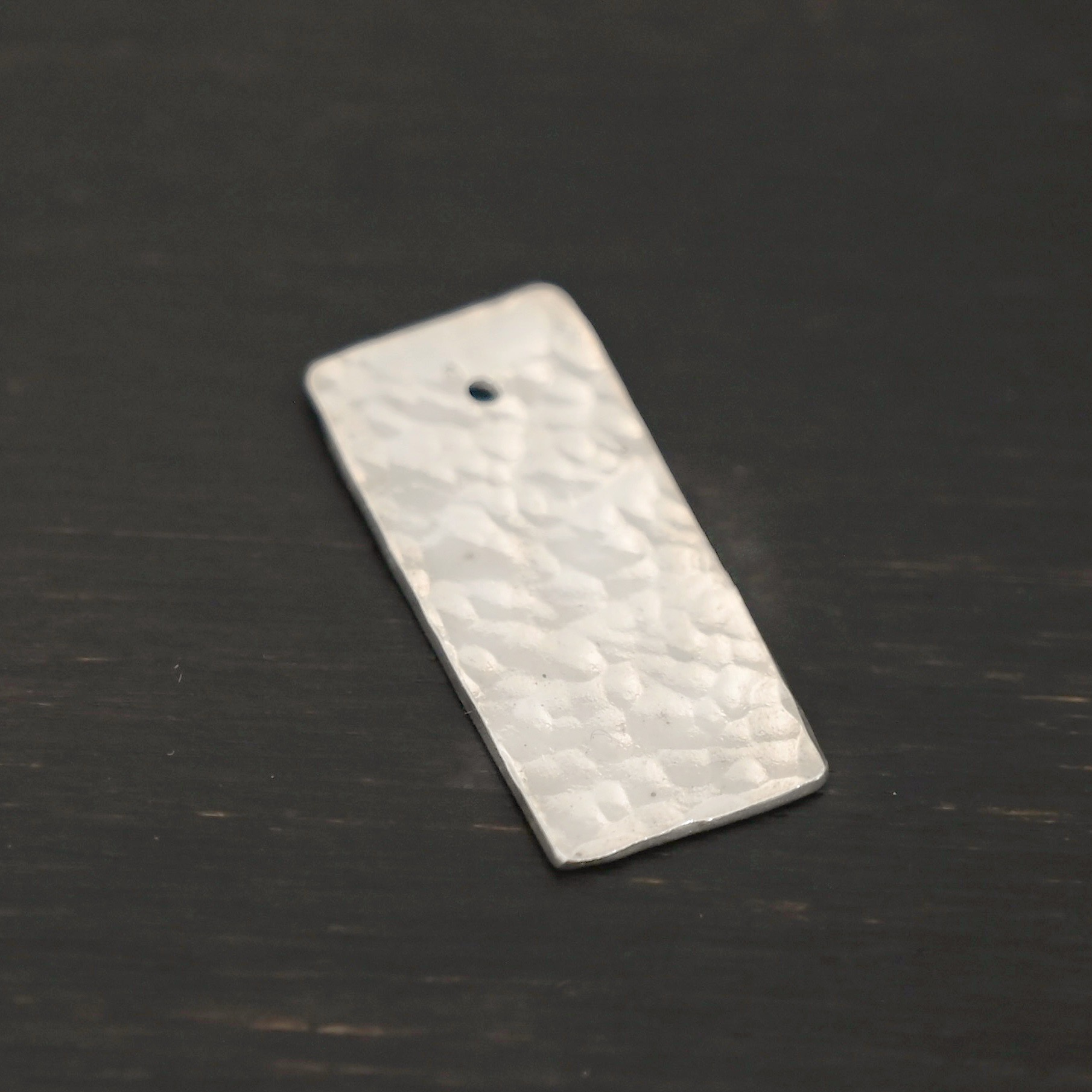 Sterling Silver Hammered Rectangle Blank - shiny shown on dark background