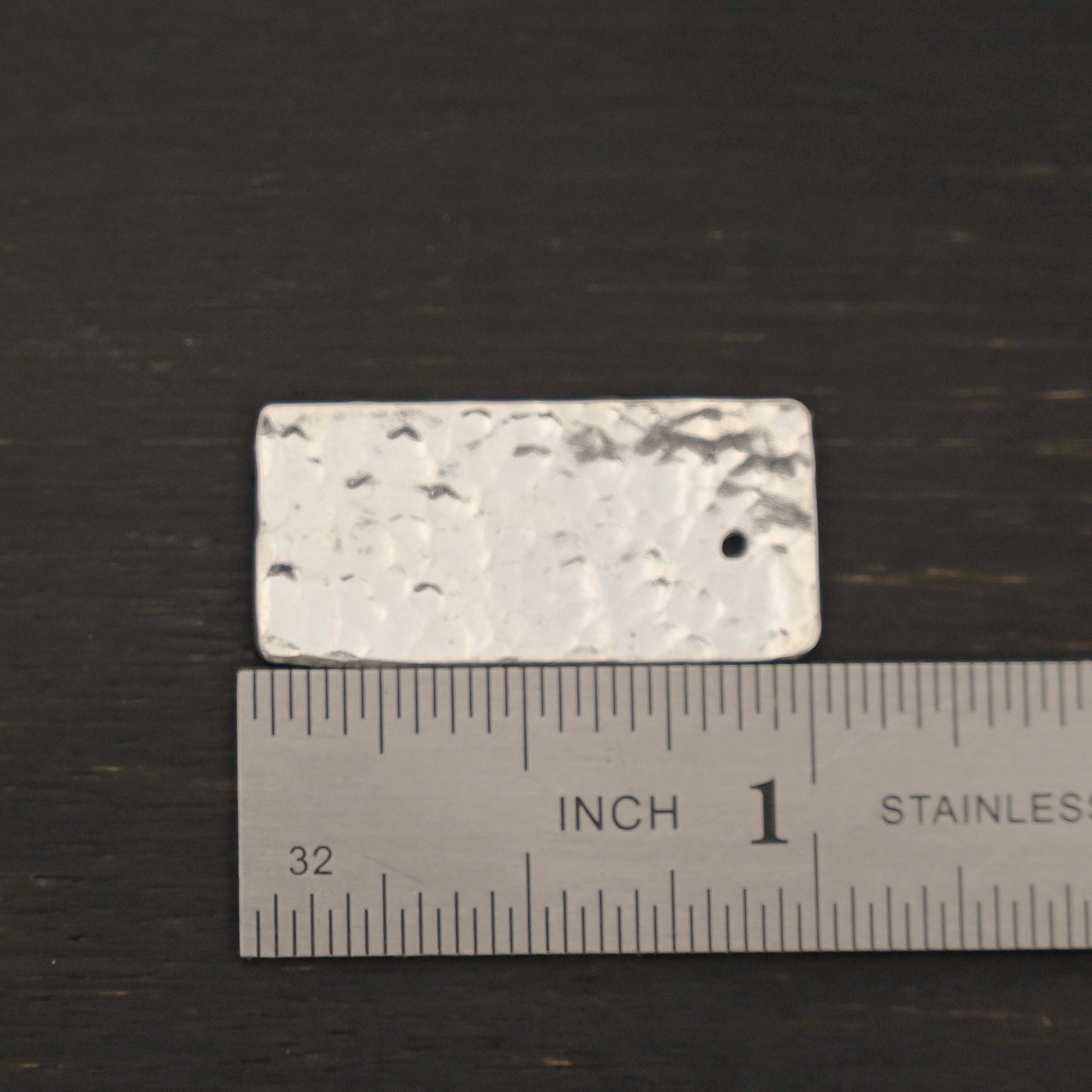 Sterling Silver Hammered Rectangle Blank - shiny shown by ruler