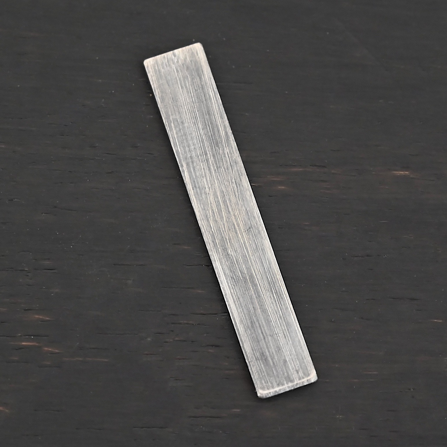 Sterling Silver Large Rectangle Blank - oxidized smooth 0 holes shown on dark background