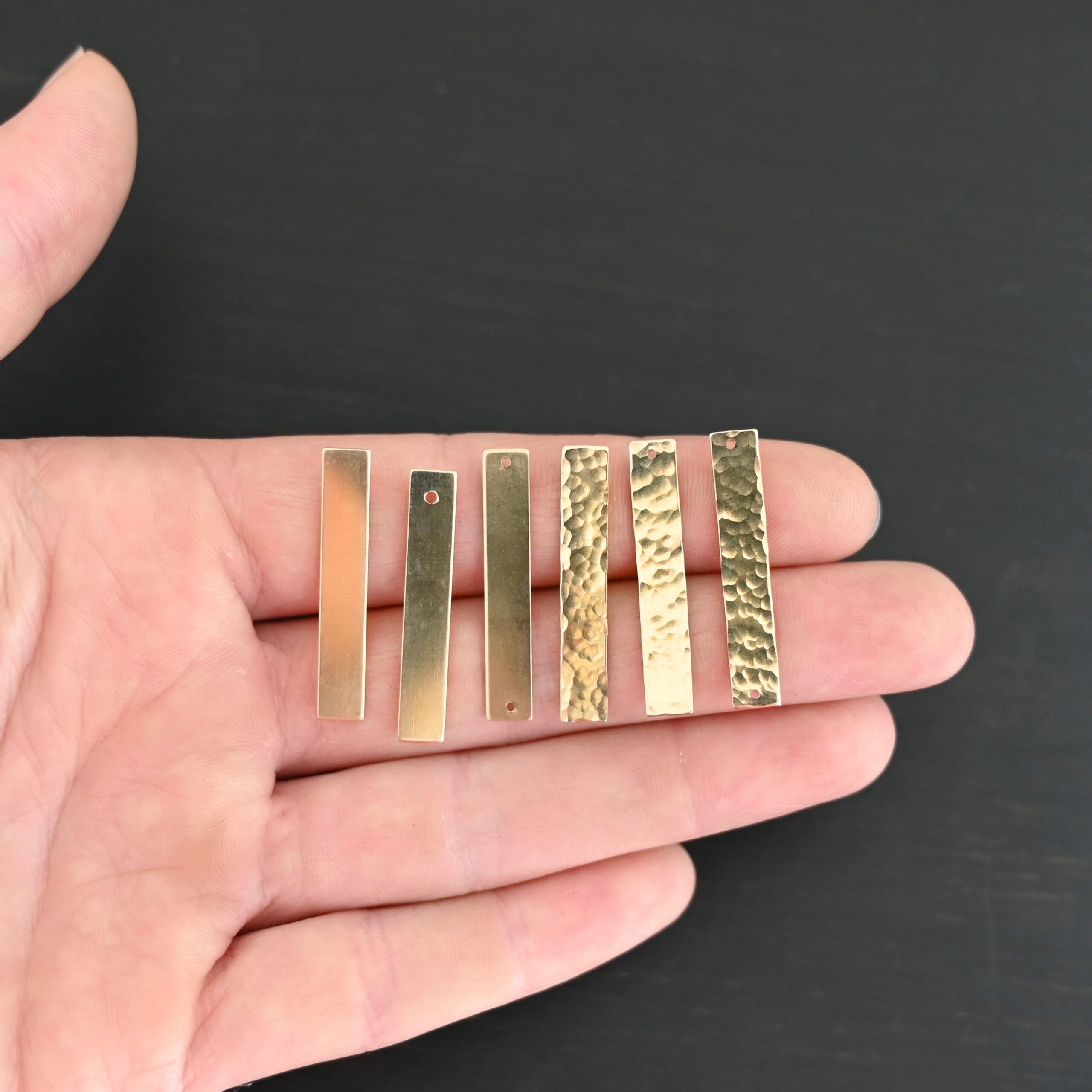 14k gold filled large rectangle blanks shown in hand