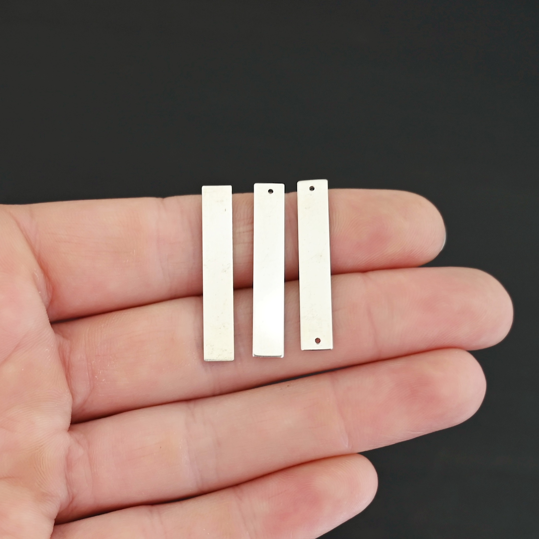 Sterling Silver large rectangle blanks - shiny smooth shown in hand