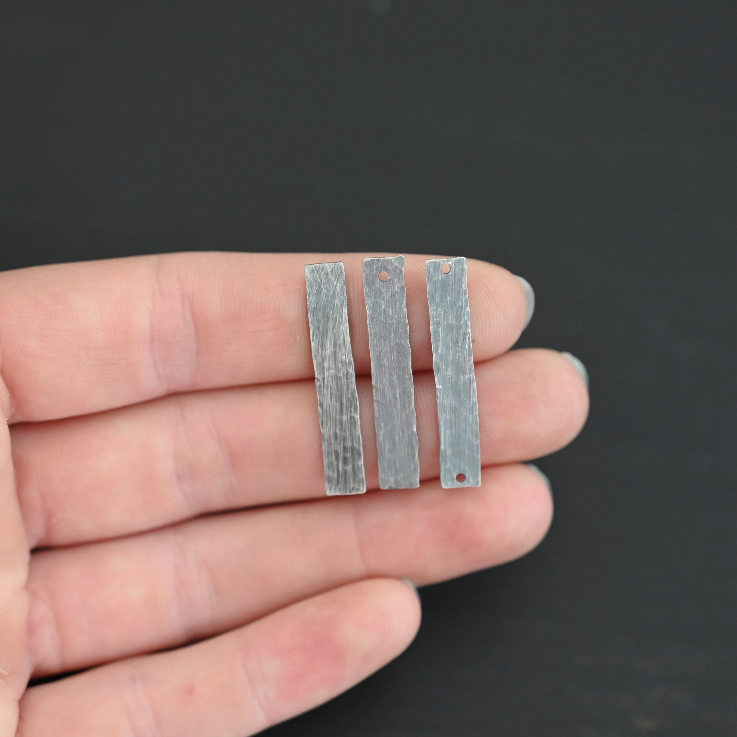 Sterling Silver large rectangle blanks - oxidized hammered shown in hand