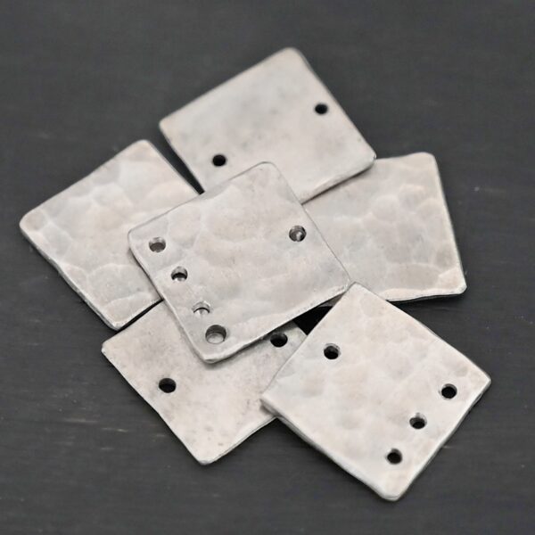 Hammered Square - shiny shown in dark background