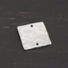Hammered Square - shiny 2 holes shown in dark background