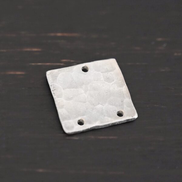 Hammered Square - shiny 3 holes shown in dark background
