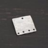 Hammered Square - shiny 5 holes shown in dark background