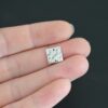 Hammered Square - shiny 2 holes shown in hand